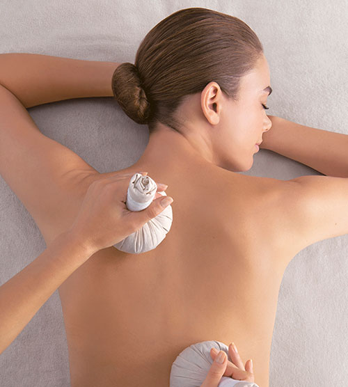 Massage Relaxant aux Ballotins de Sable Chaud